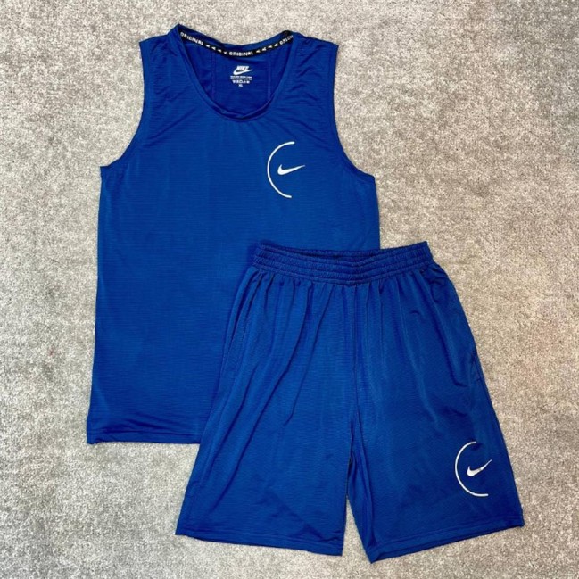 ست مردانه تاپ حلقه اي و شلوارك نايك كد 51110 عمده